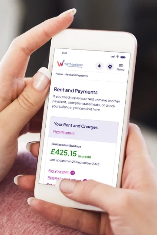 The rent and payments screen on a phone, showing a rent balance in credit and a pay your rent button.